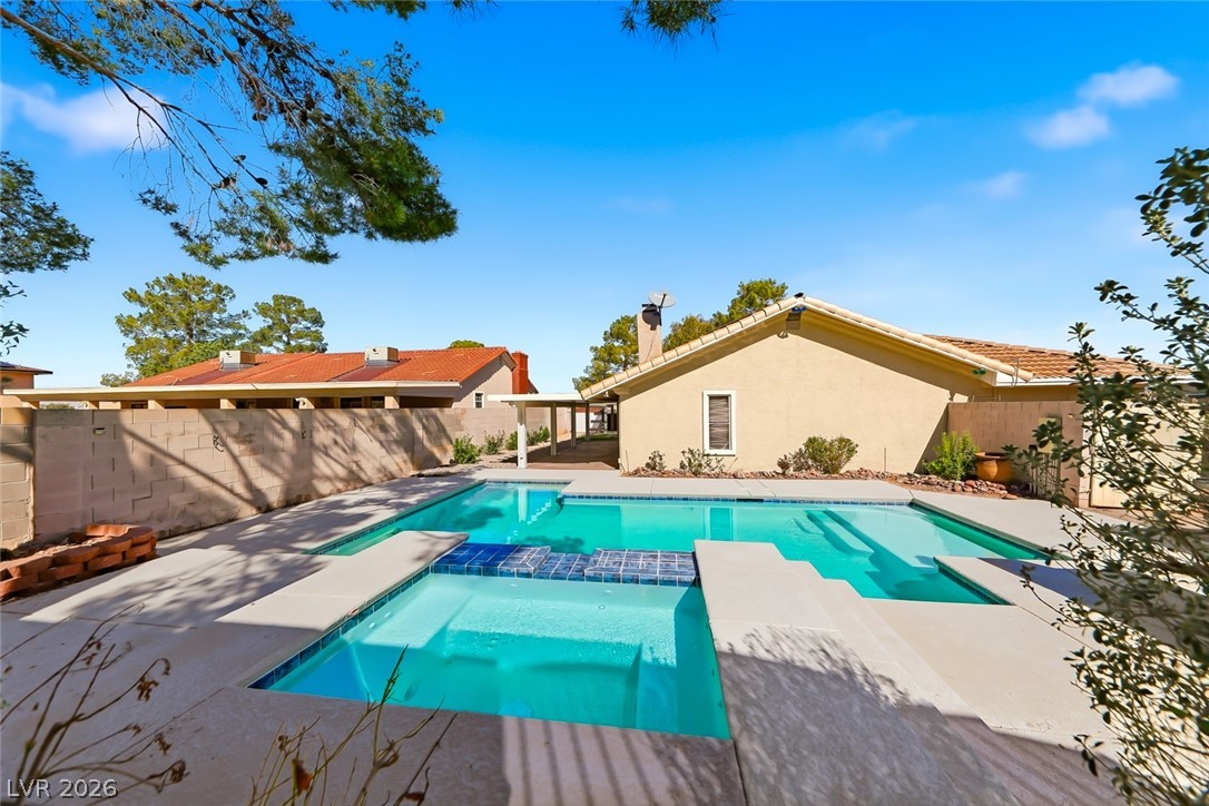 434 Crestway Road Henderson, NV 89015 - Photo 36 of 46 Relaxing pool / spa featuring a fenced backyard and a patio area