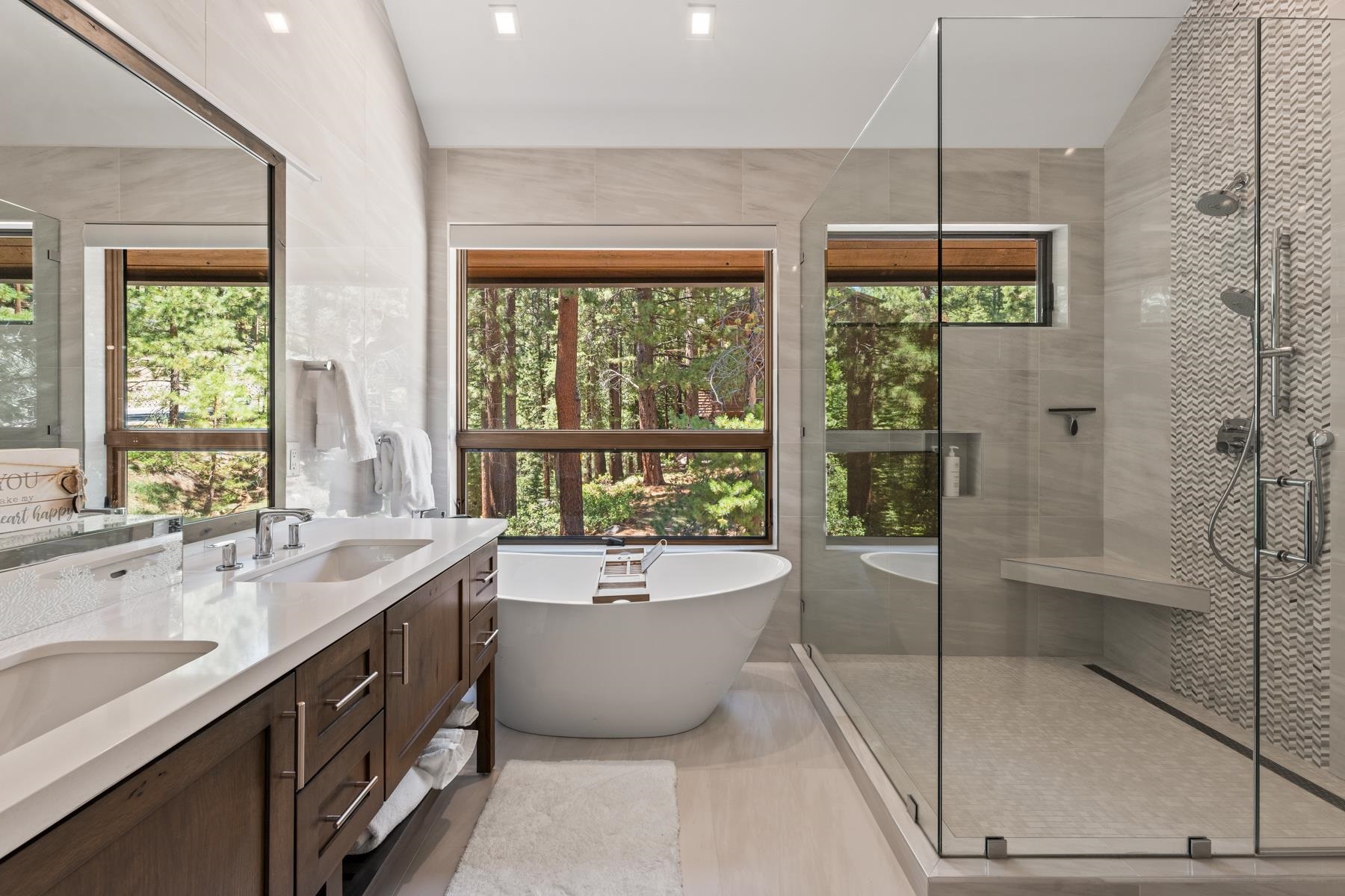 629 Tyner Way Incline Village, NV 89451 - Photo 11 of 27 a spacious bathroom with a tub sink and mirror