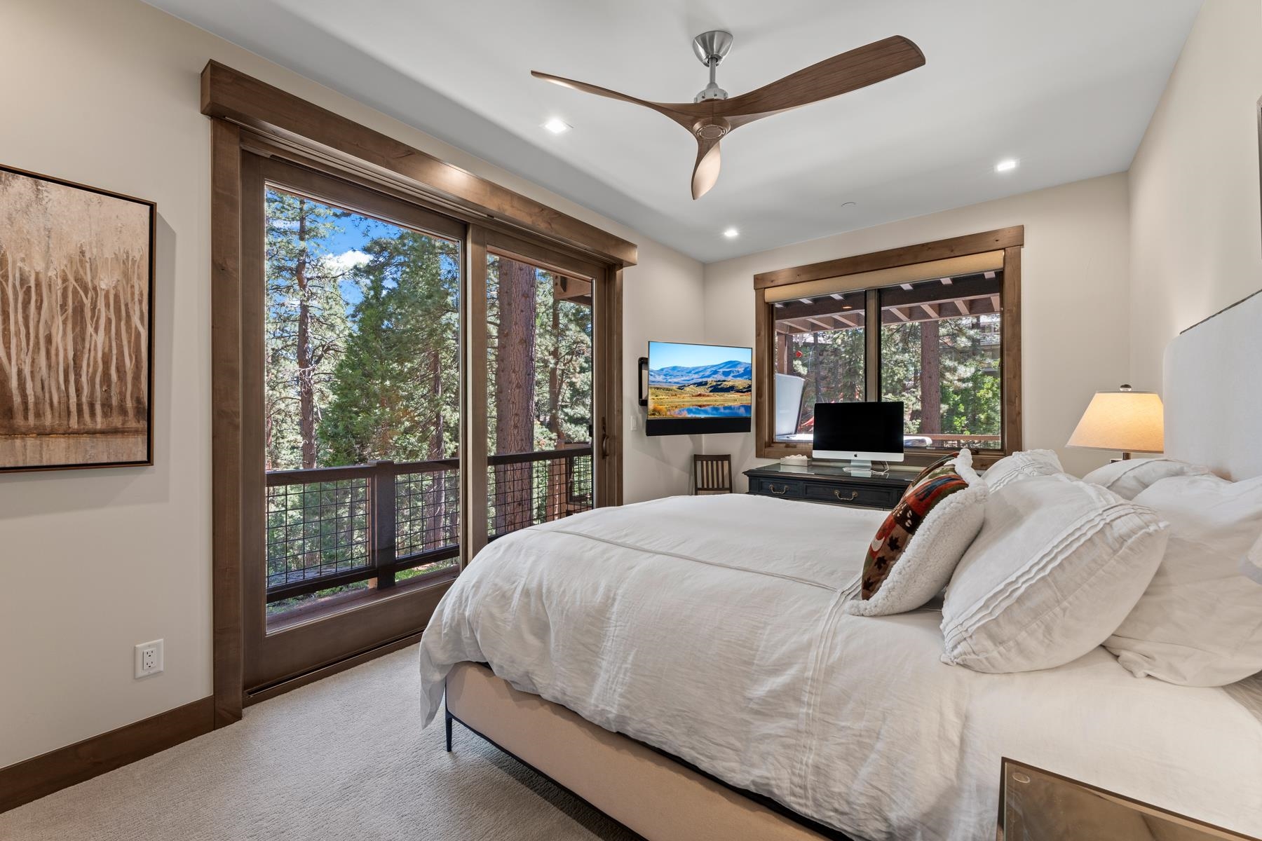 629 Tyner Way Incline Village, NV 89451 - Photo 16 of 27 a bedroom with a large bed and a large window