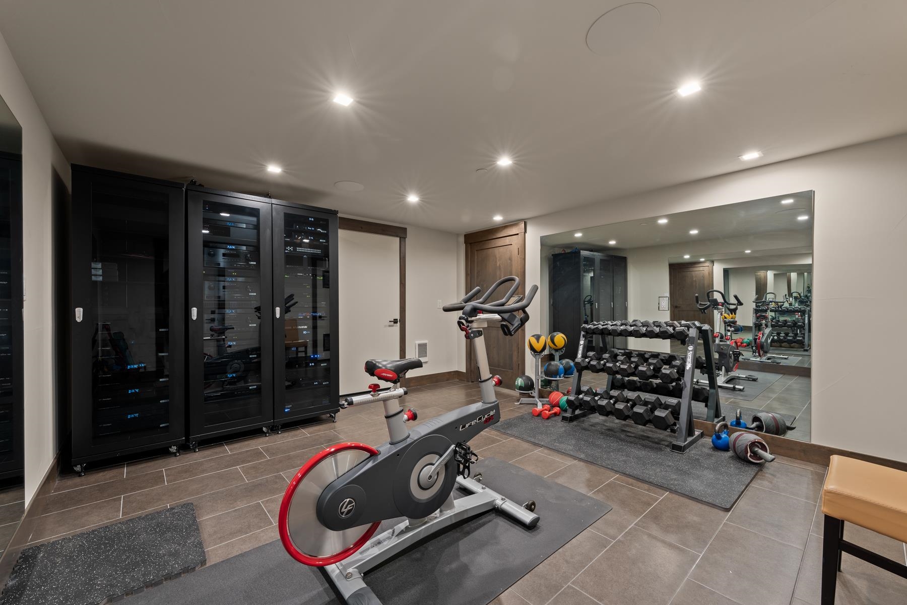 629 Tyner Way Incline Village, NV 89451 - Photo 21 of 27 a room with gym equipment and glass door