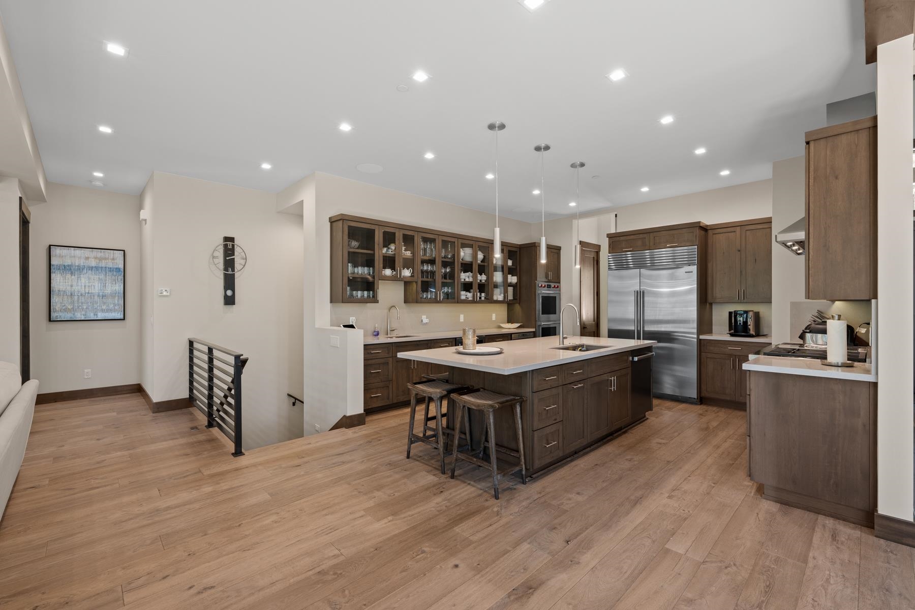 629 Tyner Way Incline Village, NV 89451 - Photo 7 of 27 a large kitchen with stainless steel appliances a large counter top a stove a chimney a sink and a refrigerator