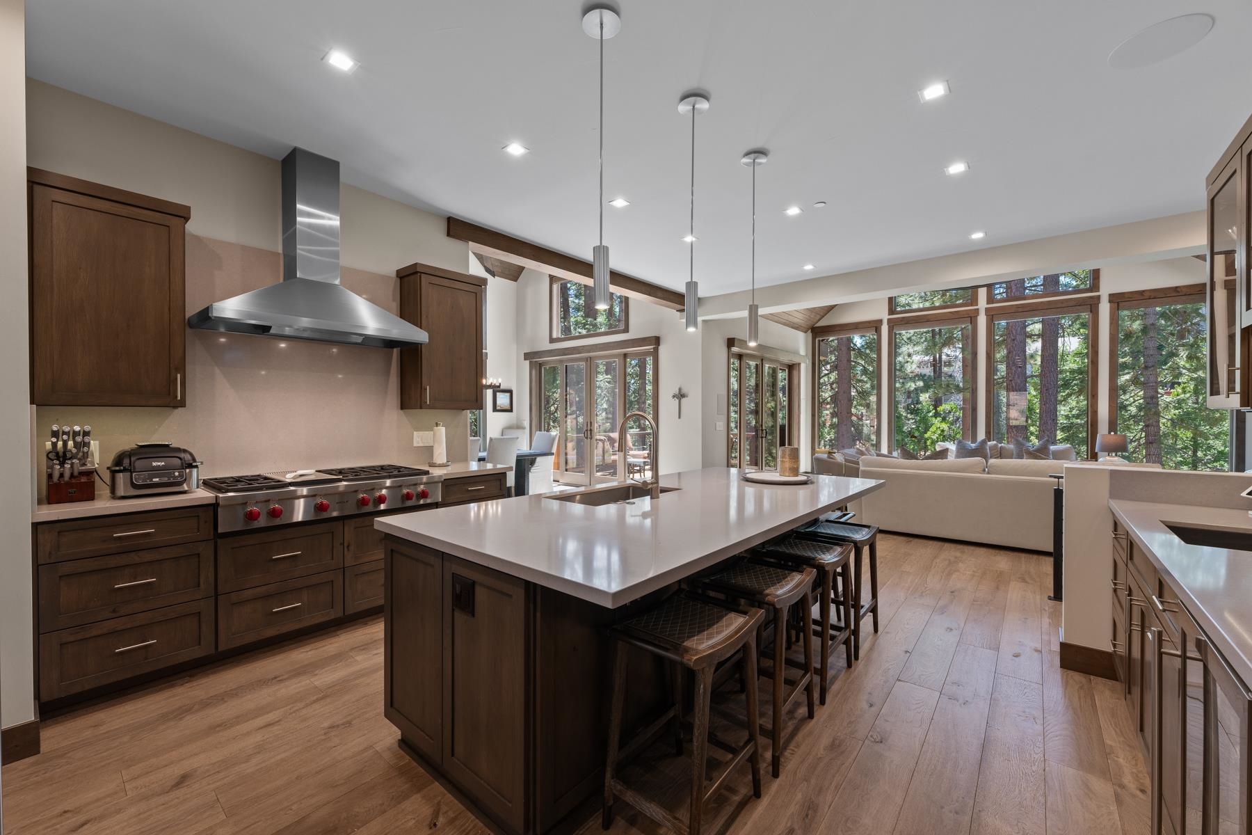 629 Tyner Way Incline Village, NV 89451 - Photo 9 of 27 a kitchen with granite countertop a stove a sink a refrigerator and wooden floor