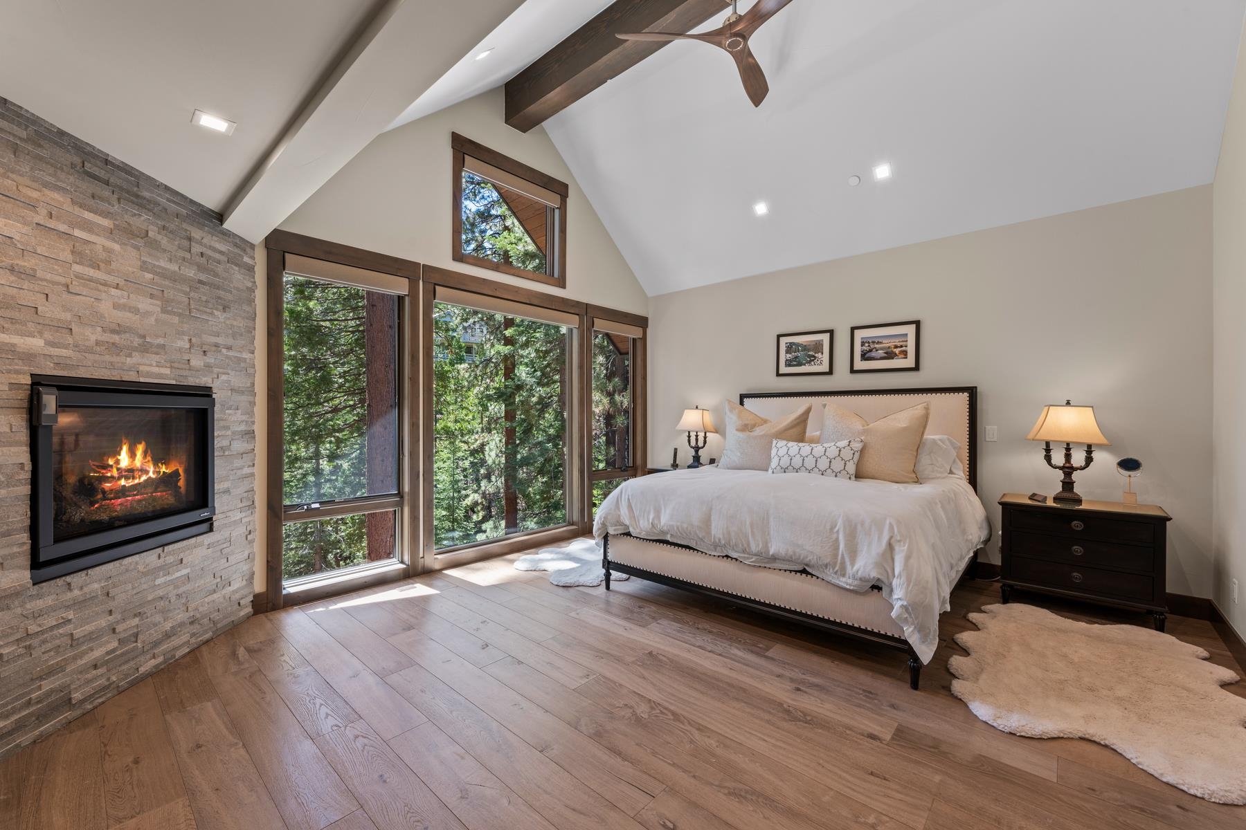 629 Tyner Way Incline Village, NV 89451 - Photo 10 of 27 a bedroom with a bed and a fireplace