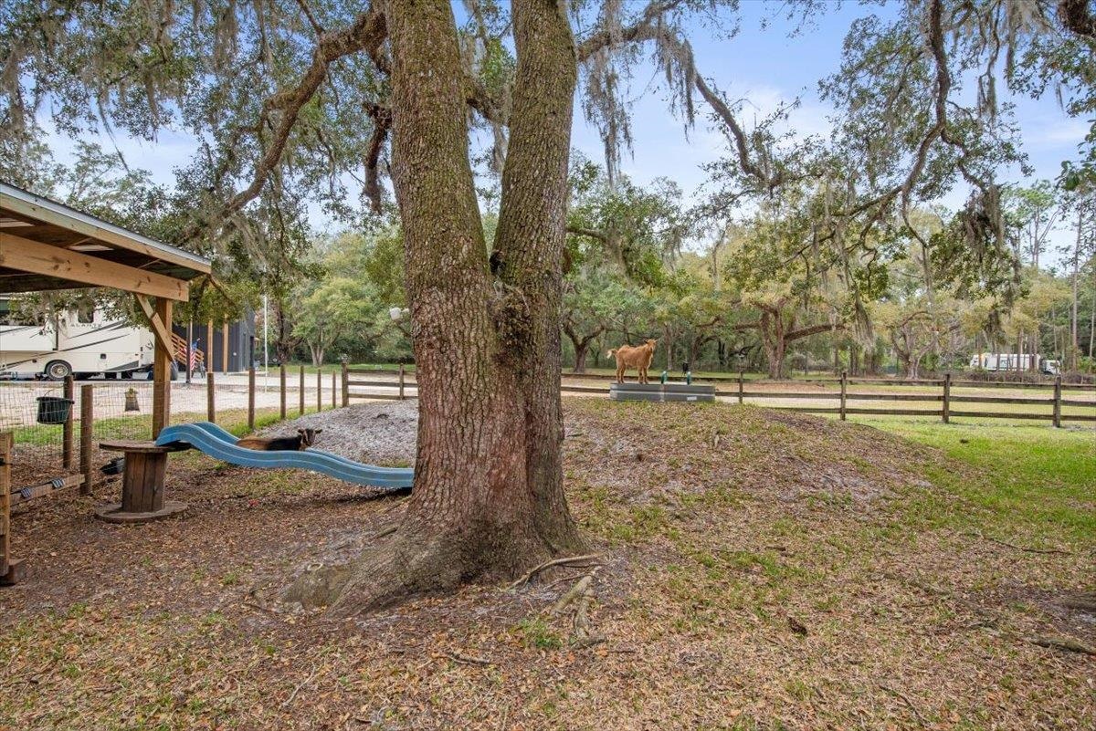 4575 Carter Road St. Augustine, FL 32086 - Photo 58 of 90 a view of outdoor space with deck and trees