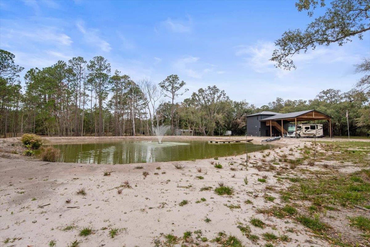 4575 Carter Road St. Augustine, FL 32086 - Photo 65 of 90 a view of lake with houses in the background