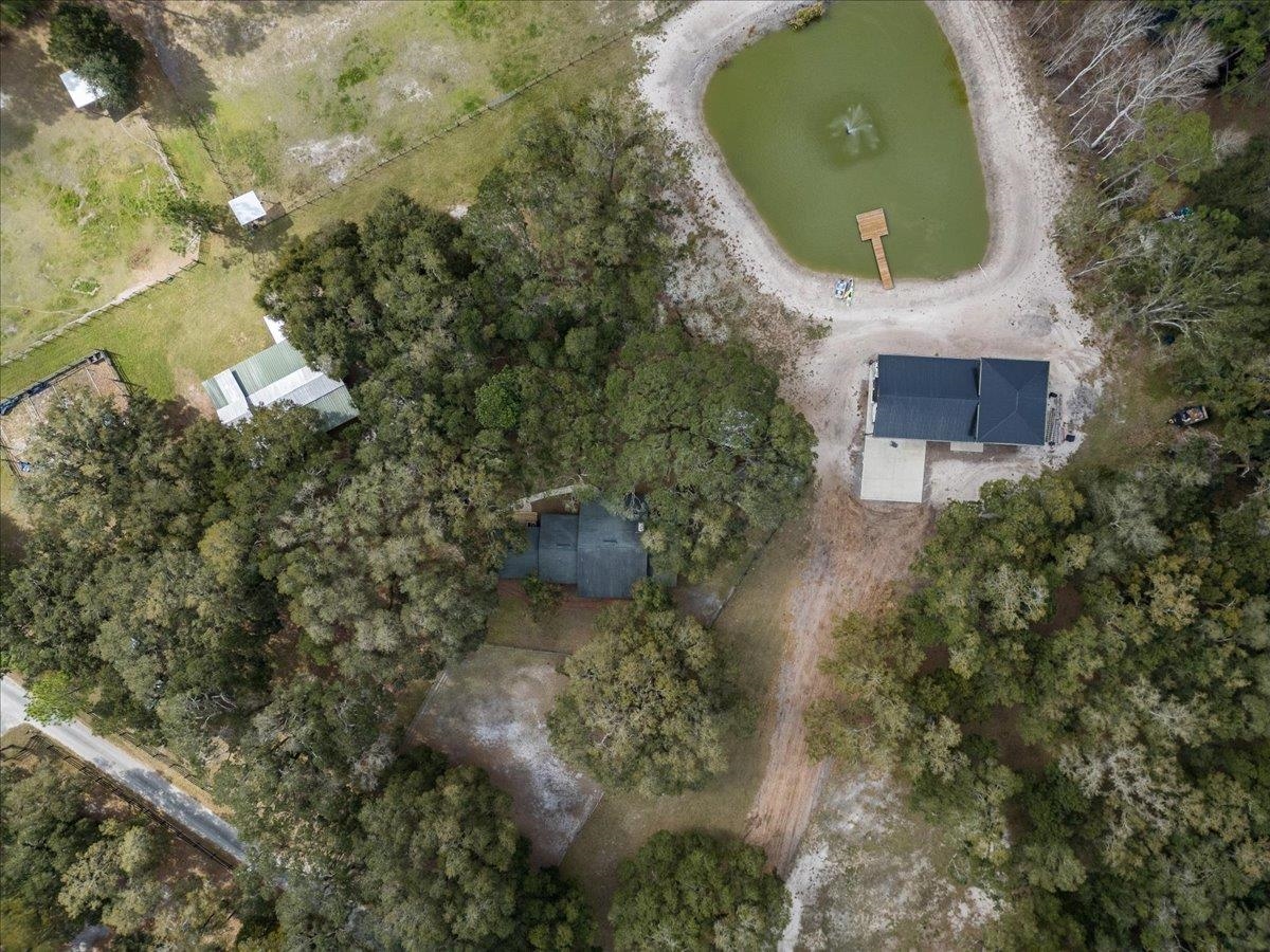 4575 Carter Road St. Augustine, FL 32086 - Photo 9 of 90 an aerial view of a house with a yard and swimming pool