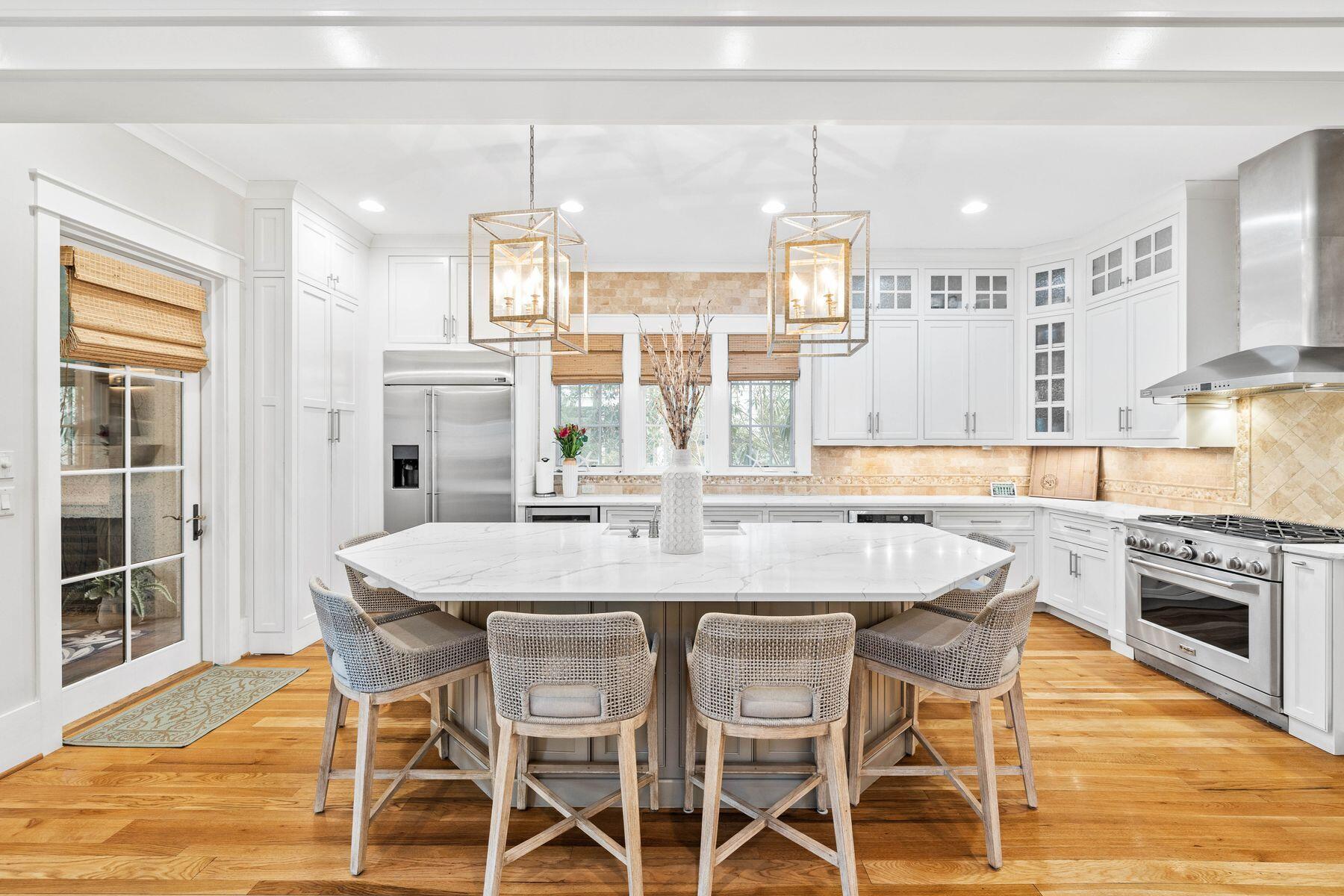 76 Tidepool Lane Watersound, FL 32461 - Photo 4 of 41 a kitchen with a table and chairs in it