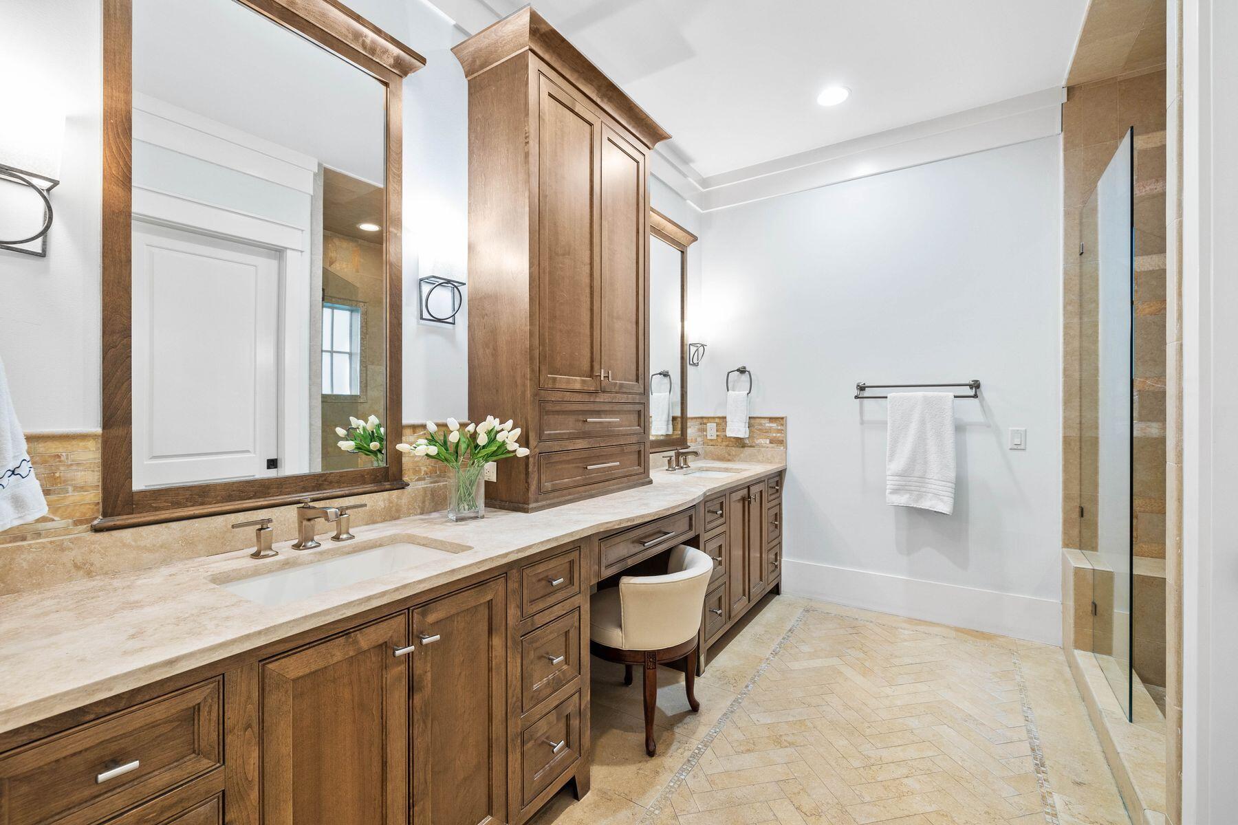 76 Tidepool Lane Watersound, FL 32461 - Photo 8 of 41 a bathroom with a double vanity sink and a mirror