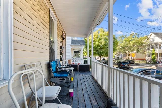 a view of balcony with chairs