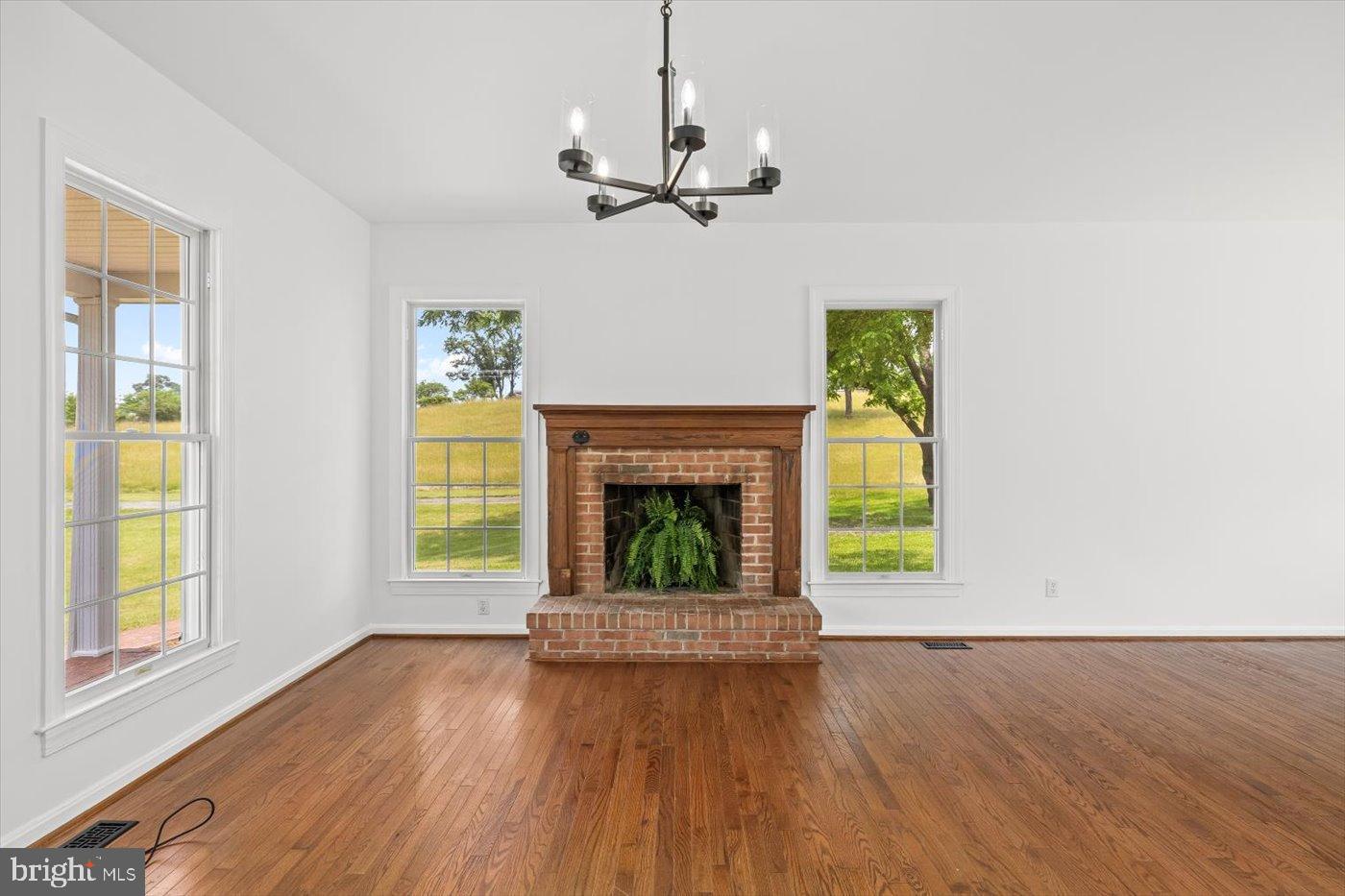 274 A Aaron Mountain Road Castleton, VA 22716 - Photo 7 of 76 Bright and airy living space with charm.