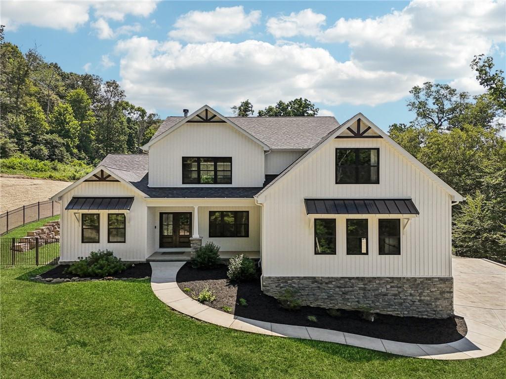 1565 Neville Road Beaver, PA 15009 - Photo 1 of 50 a front view of a house with a yard