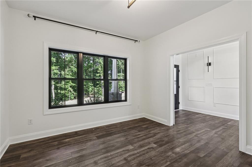 1565 Neville Road Beaver, PA 15009 - Photo 16 of 50 an empty room with wooden floor and windows