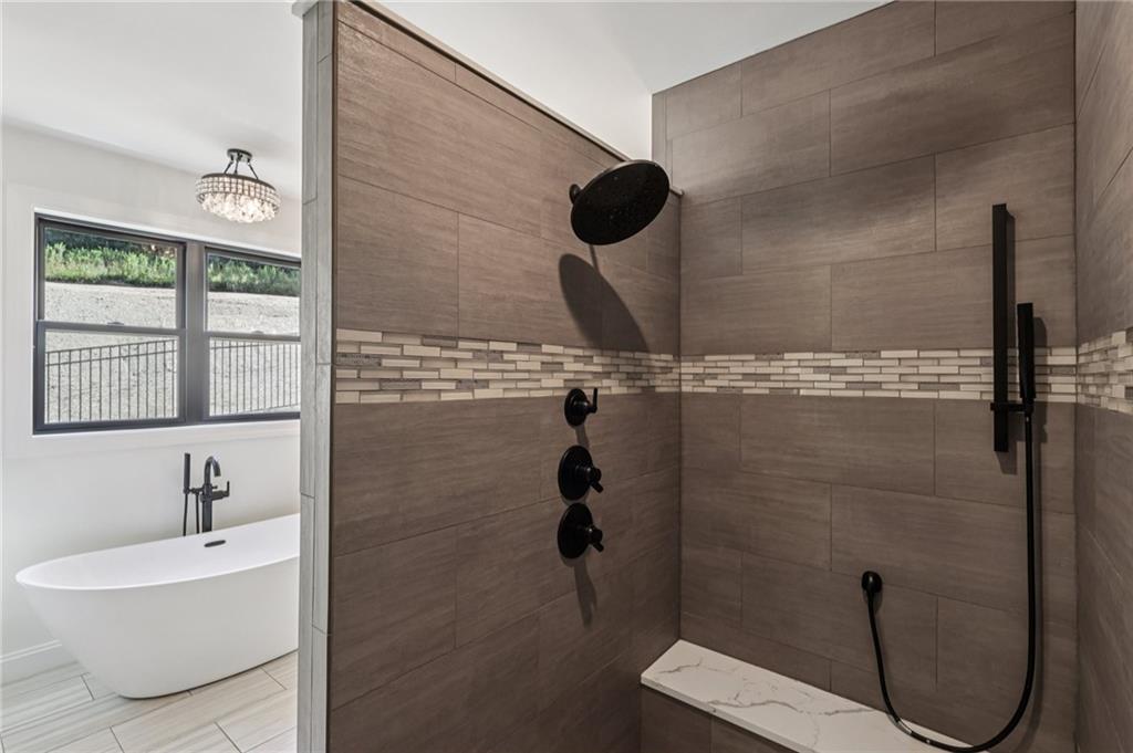 1565 Neville Road Beaver, PA 15009 - Photo 21 of 50 a bathroom with a sink toilet and shower