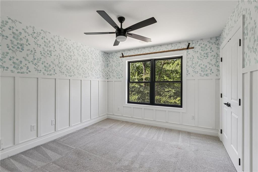 1565 Neville Road Beaver, PA 15009 - Photo 31 of 50 an empty room with windows and fan