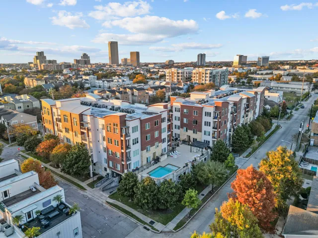 a aerial view of multi story residential apartment building