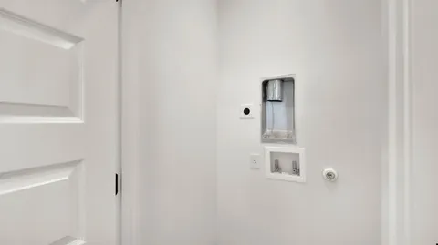 a room with cabinet and closet