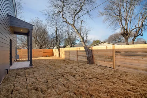 a view of a yard with trees