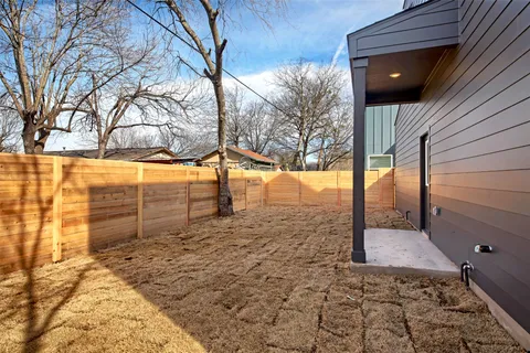 a view of a yard with an outdoor space