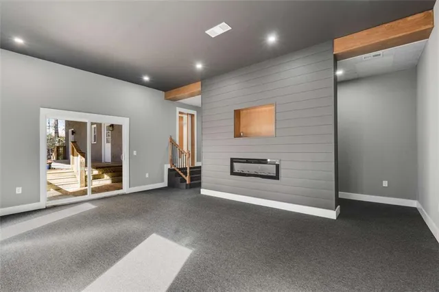 a view of a livingroom with a staircase