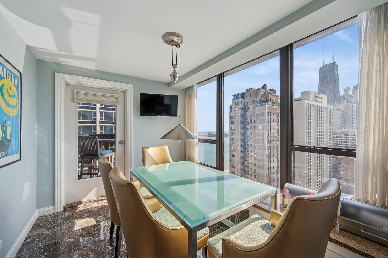 1313 North Ritchie Court, Unit 2701 Chicago, IL 60610 - Photo 13 of 33 a living room with furniture and a window