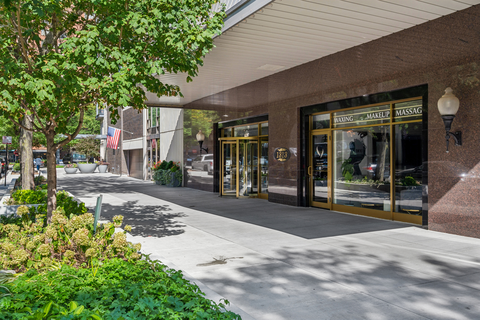 1313 North Ritchie Court, Unit 2701 Chicago, IL 60610 - Photo 2 of 33 a view of a building with a pathway and a pathway