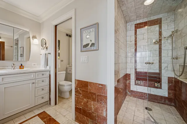 a spacious bathroom with a shower a sink and a mirror