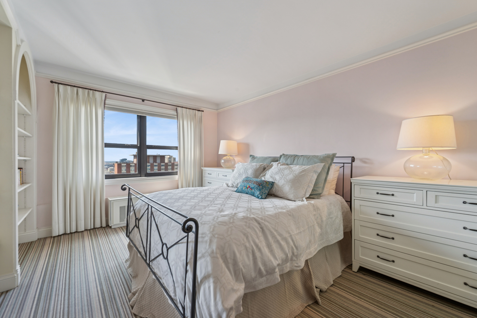 1313 North Ritchie Court, Unit 2701 Chicago, IL 60610 - Photo 23 of 33 a bedroom with a bed and a dresser