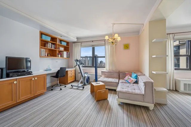 a room with furniture and wooden floor