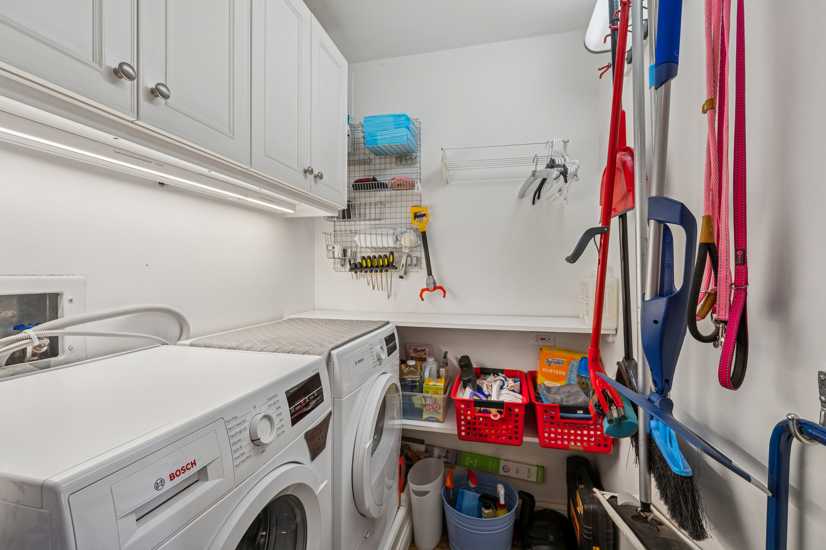 1313 North Ritchie Court, Unit 2701 Chicago, IL 60610 - Photo 28 of 33 a utility room with dryer and washer