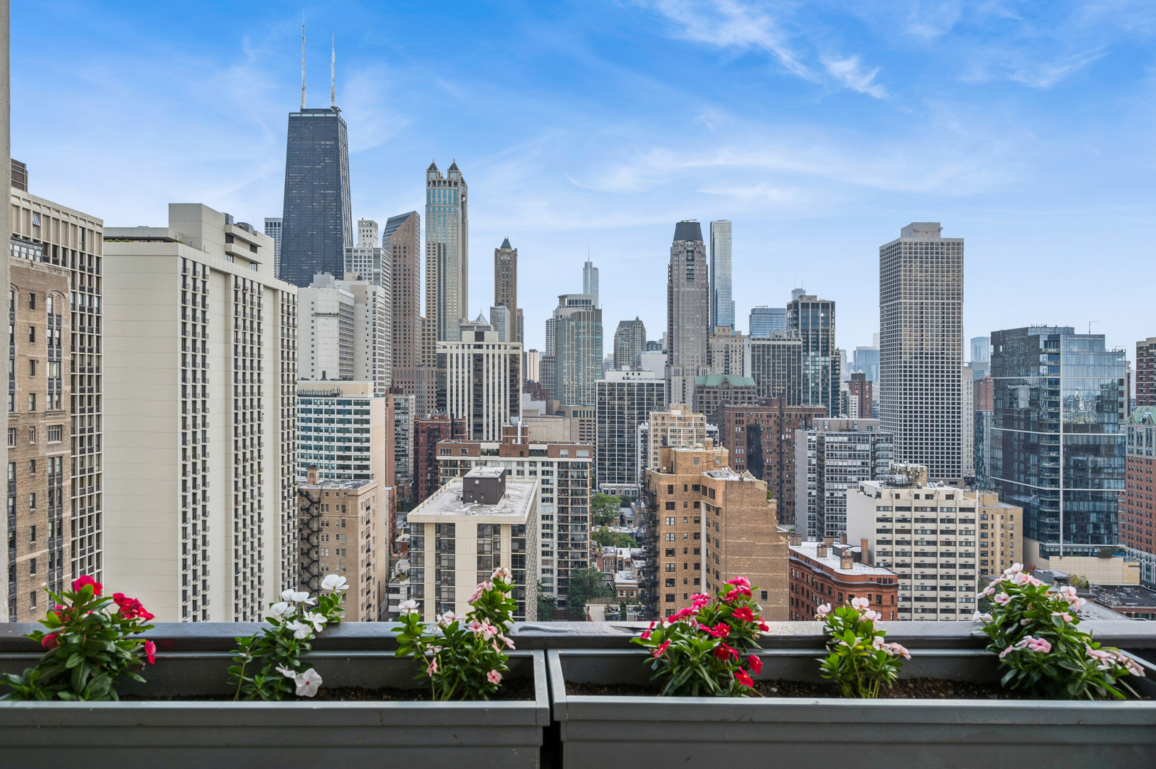1313 North Ritchie Court, Unit 2701 Chicago, IL 60610 - Photo 31 of 33 a city view with tall buildings