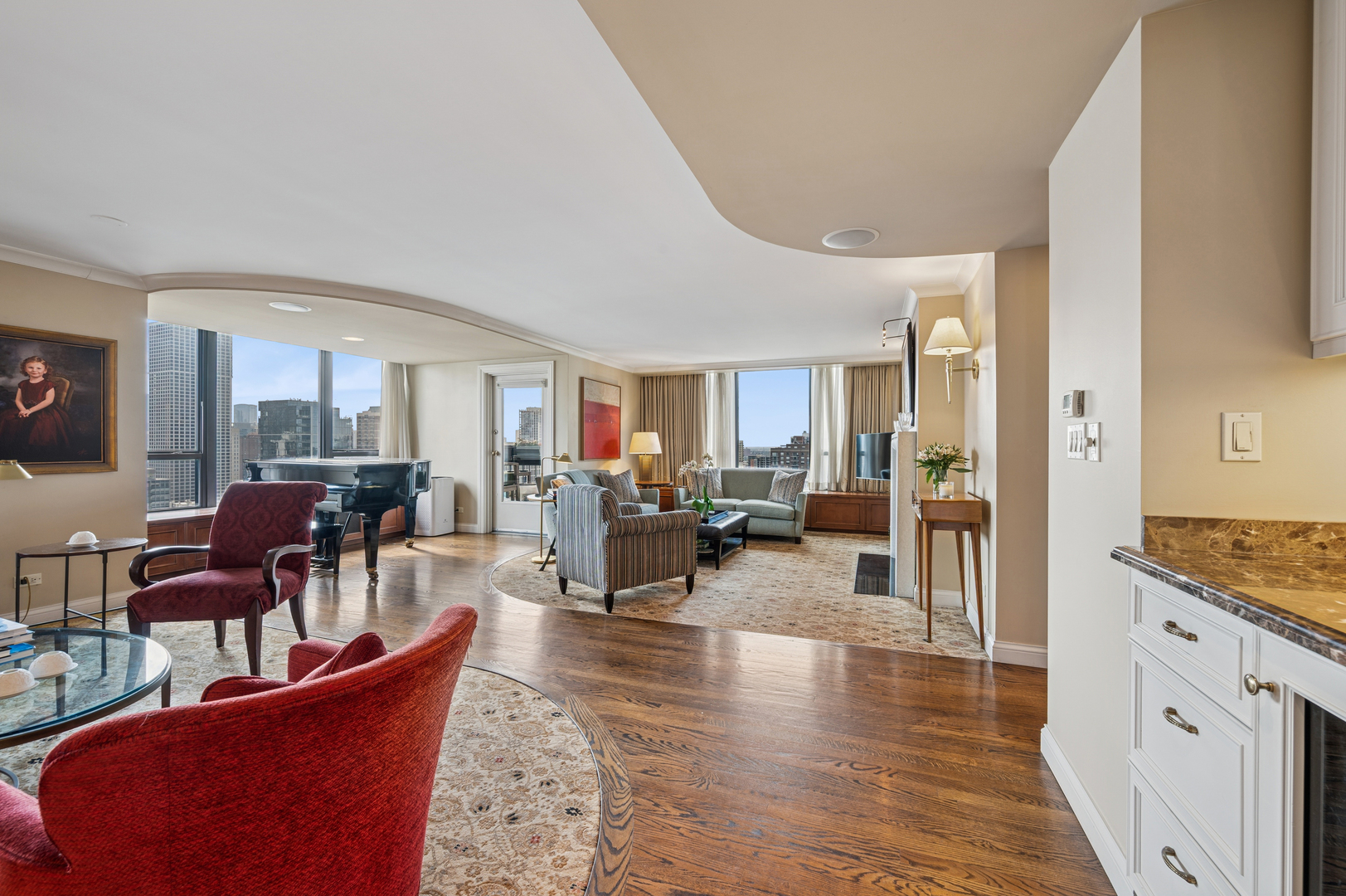 1313 North Ritchie Court, Unit 2701 Chicago, IL 60610 - Photo 5 of 33 a living room with furniture and wooden floor