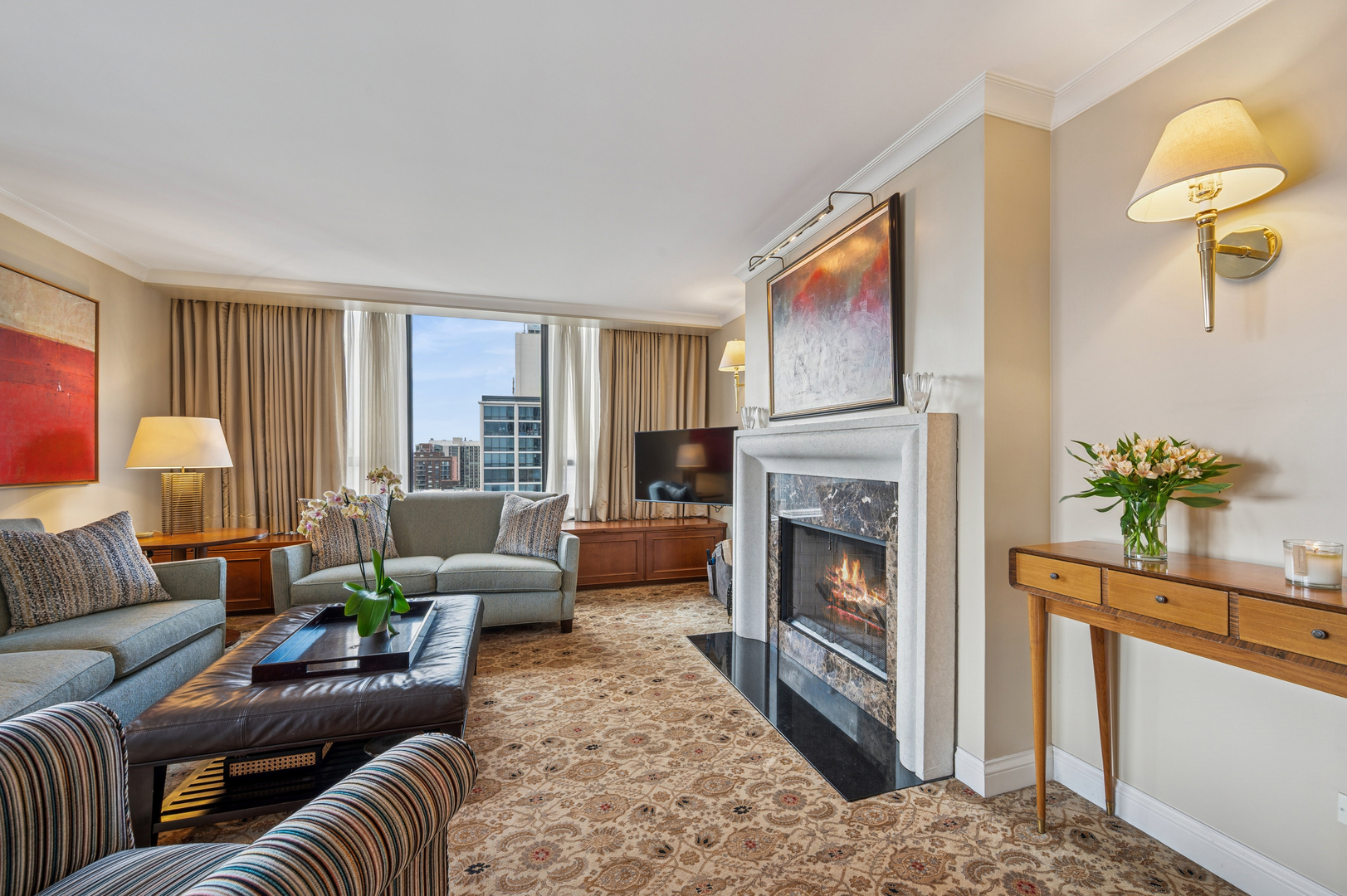1313 North Ritchie Court, Unit 2701 Chicago, IL 60610 - Photo 6 of 33 a living room with furniture and a fireplace