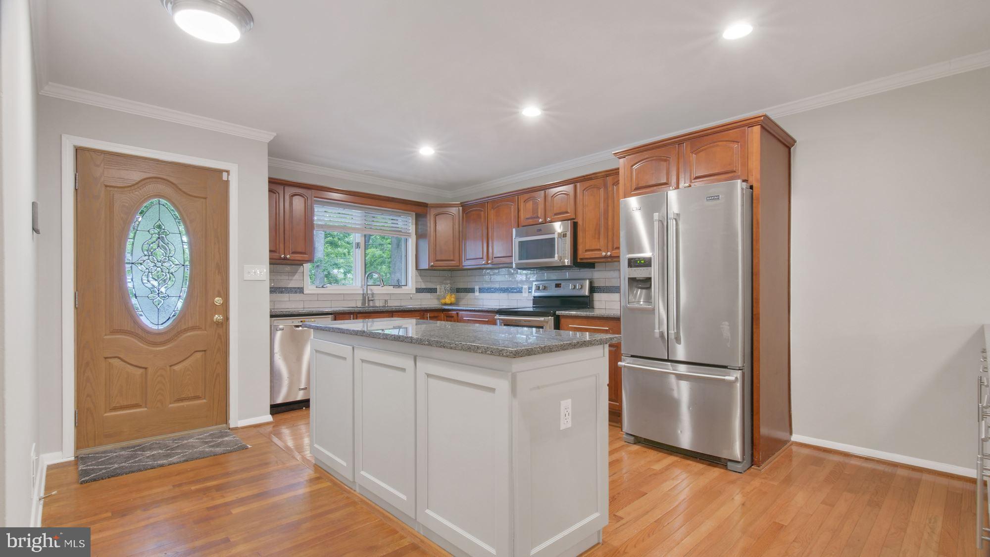 6518 Hackberry Street Springfield, VA 22150 - Photo 5 of 44 Kitchen with stainless steel appliances