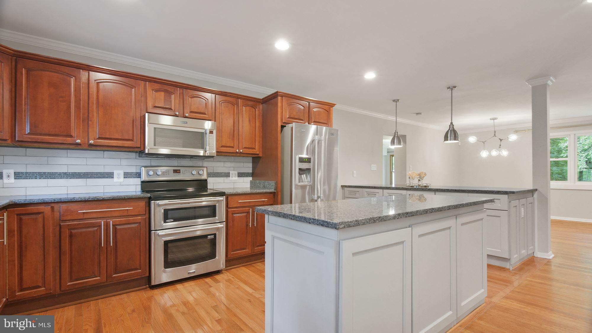 6518 Hackberry Street Springfield, VA 22150 - Photo 8 of 44 Kitchen with upgraded granite countertops