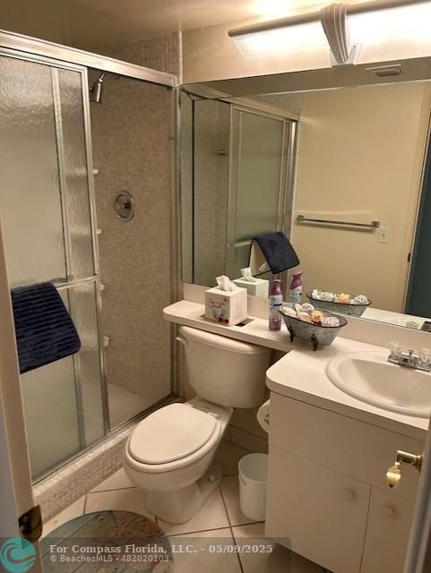 2731 Northeast 14th Street Causeway, Unit 612 Pompano Beach, FL 33062 - Photo 11 of 22 a bathroom with a sink toilet and shower