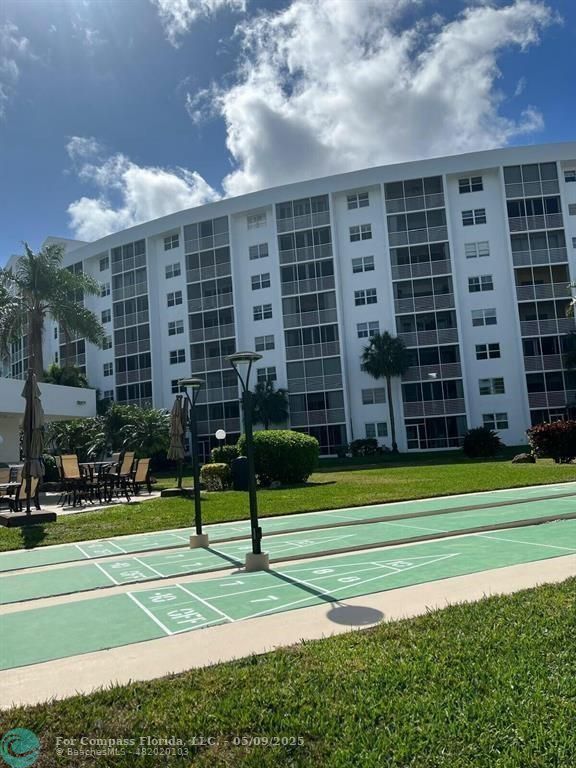 2731 Northeast 14th Street Causeway, Unit 612 Pompano Beach, FL 33062 - Photo 18 of 22 a view of a big building