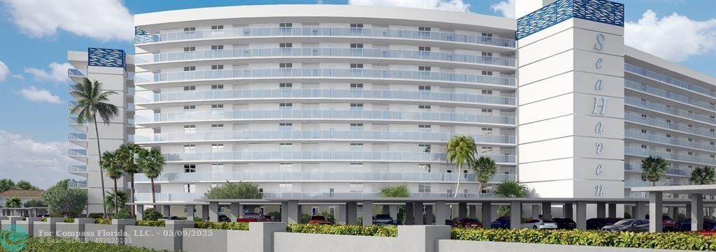 2731 Northeast 14th Street Causeway, Unit 612 Pompano Beach, FL 33062 - Photo 3 of 22 a front view of a building with street