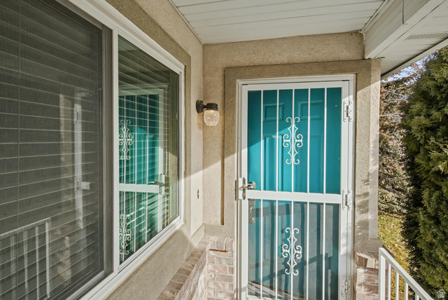 281 Winchester Drive Springville, UT 84663 - Photo 3 of 27 Doorway to property with stucco siding