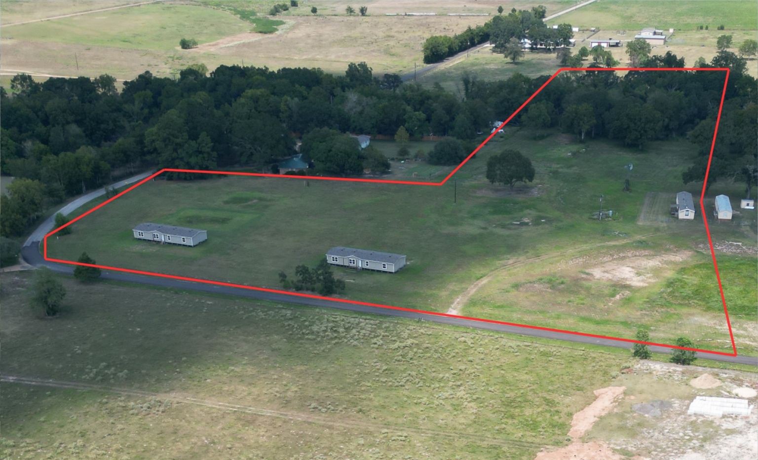 198 Langberg Road Bellville, TX 77418 - Photo 6 of 9 a view of a backyard