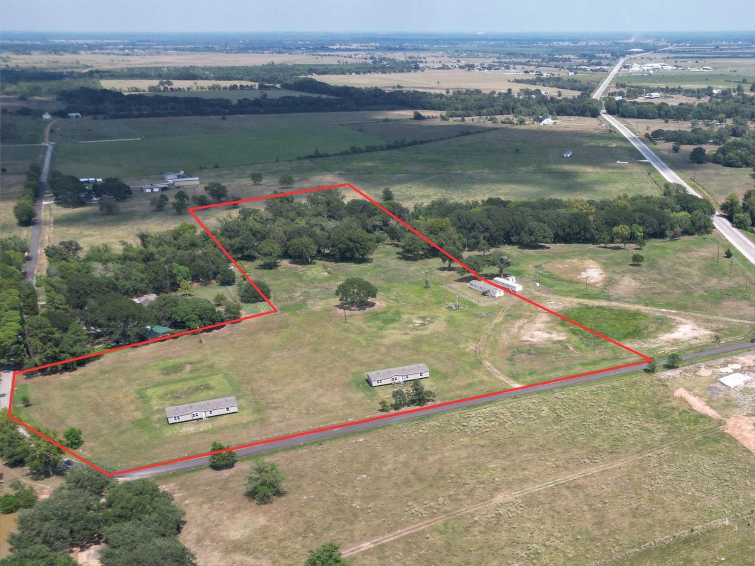 198 Langberg Road Bellville, TX 77418 - Photo 7 of 9 an aerial view of a houses