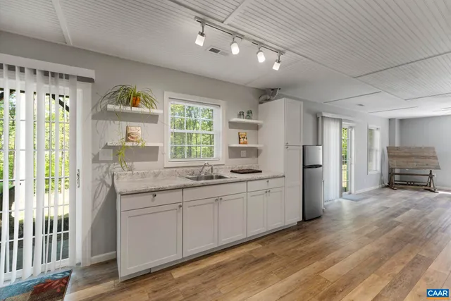 a view of backyard with green space