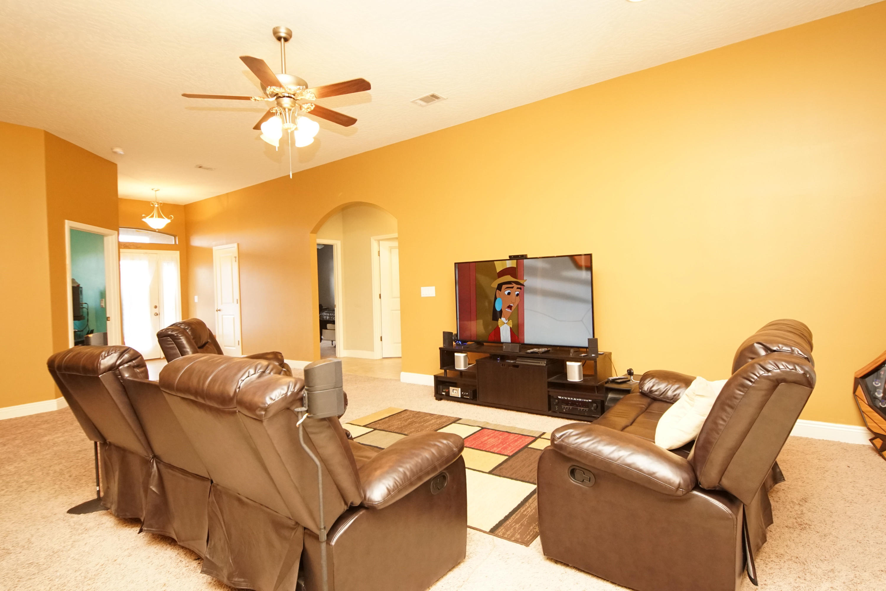 4628 Hermosa Road Crestview, FL 32539 - Photo 15 of 40 a living room with furniture and a large window
