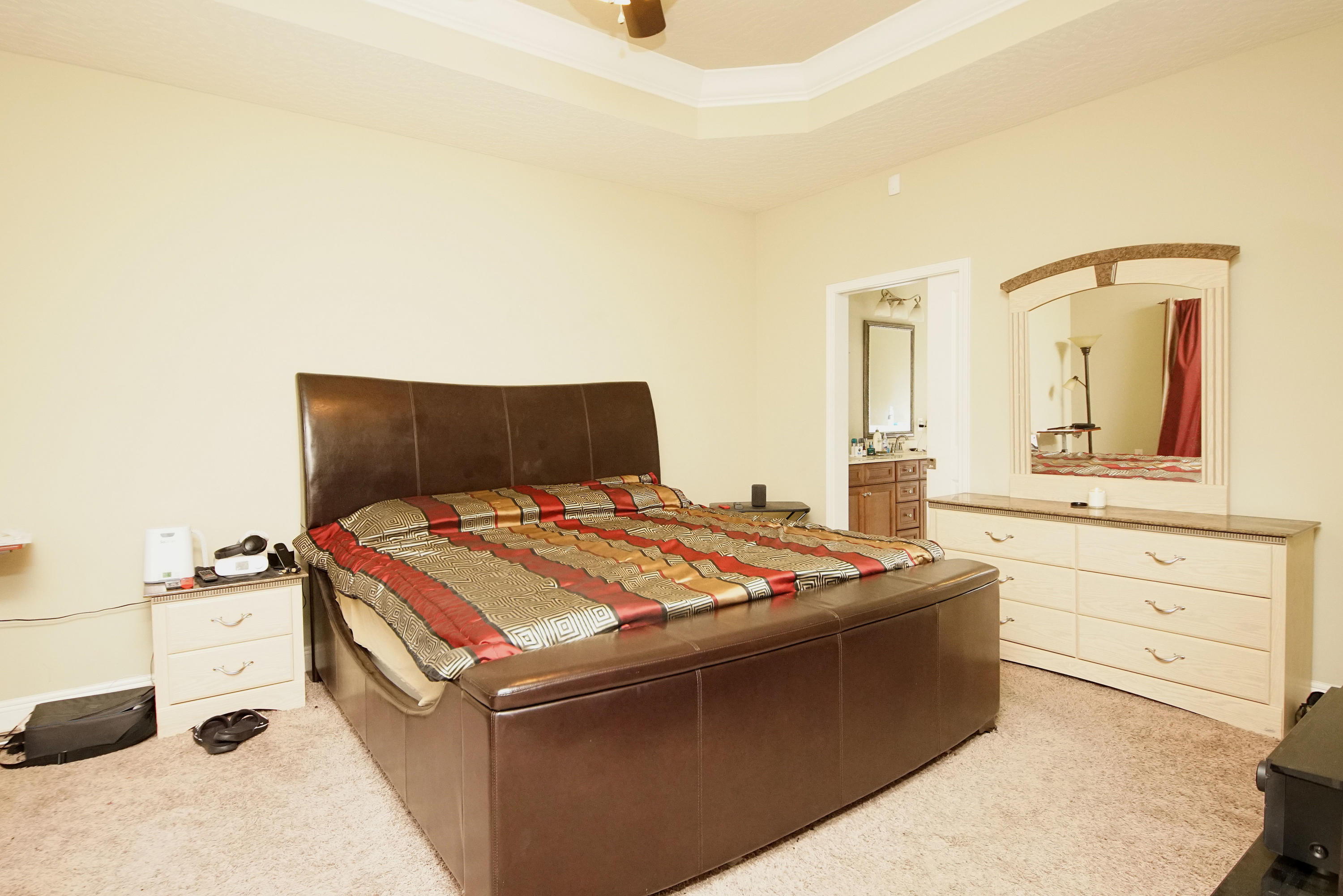 4628 Hermosa Road Crestview, FL 32539 - Photo 19 of 40 a bedroom with a bed and a dresser
