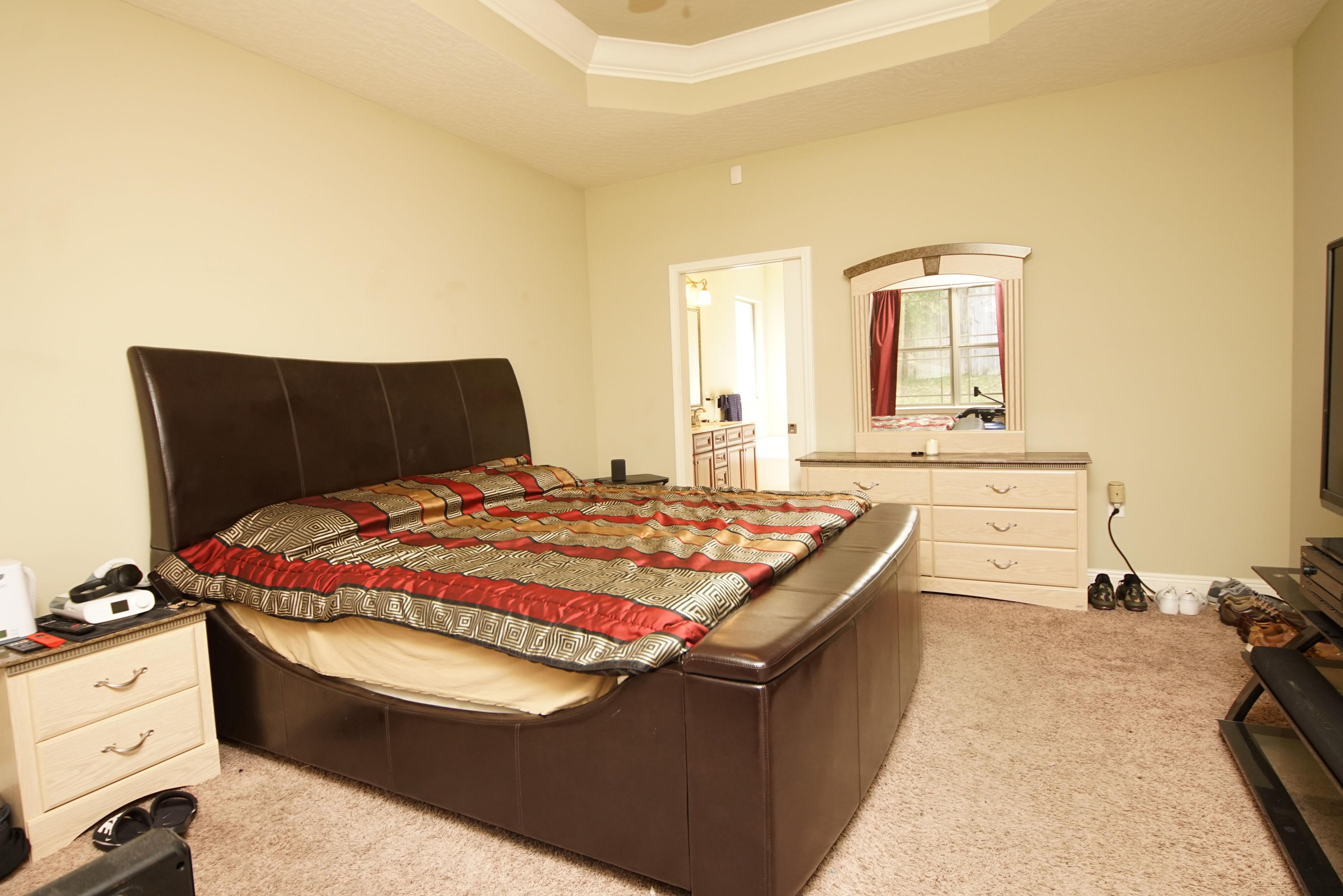 4628 Hermosa Road Crestview, FL 32539 - Photo 20 of 40 a bedroom with a bed and a dresser