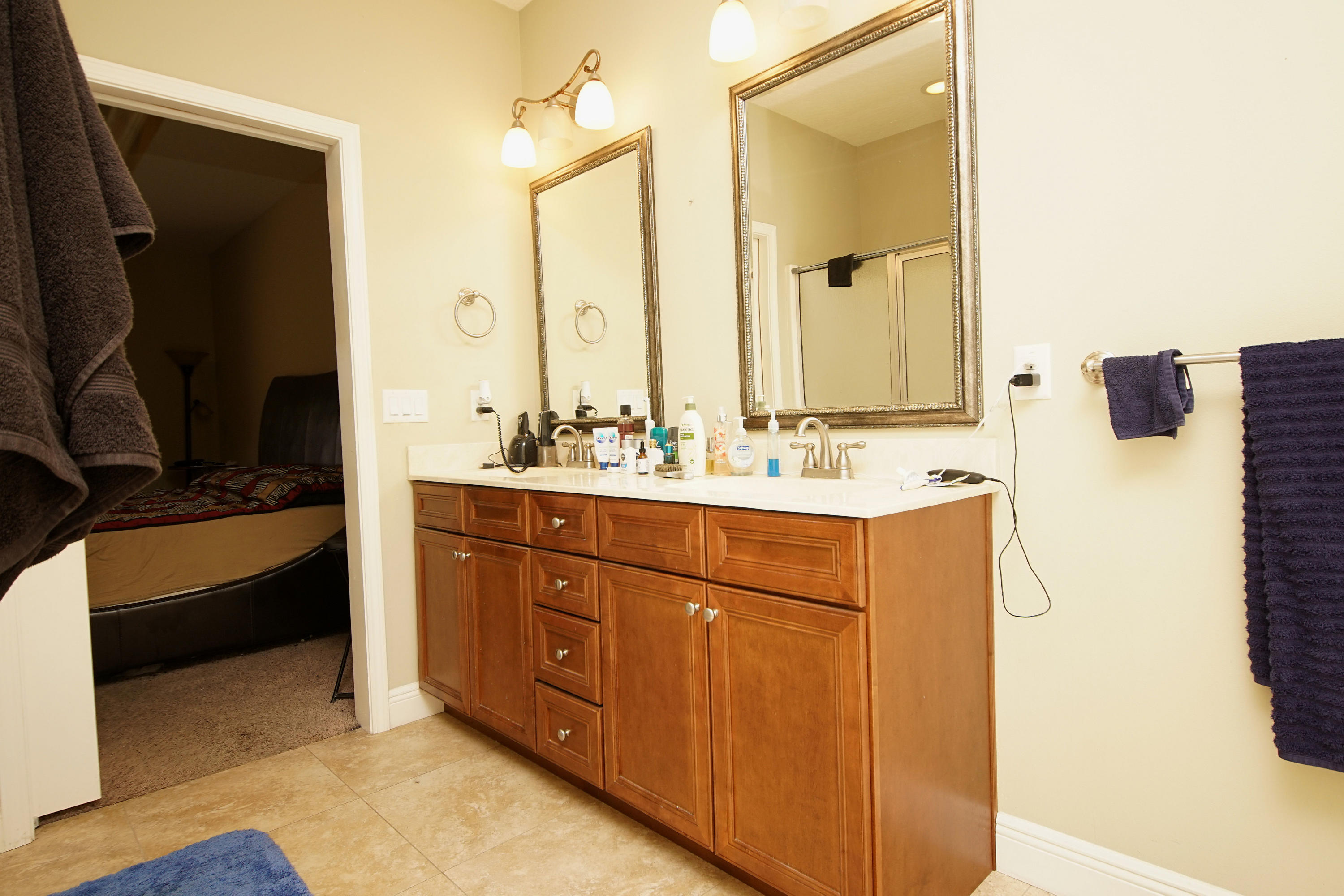 4628 Hermosa Road Crestview, FL 32539 - Photo 24 of 40 a bathroom with a sink double vanity and a mirror