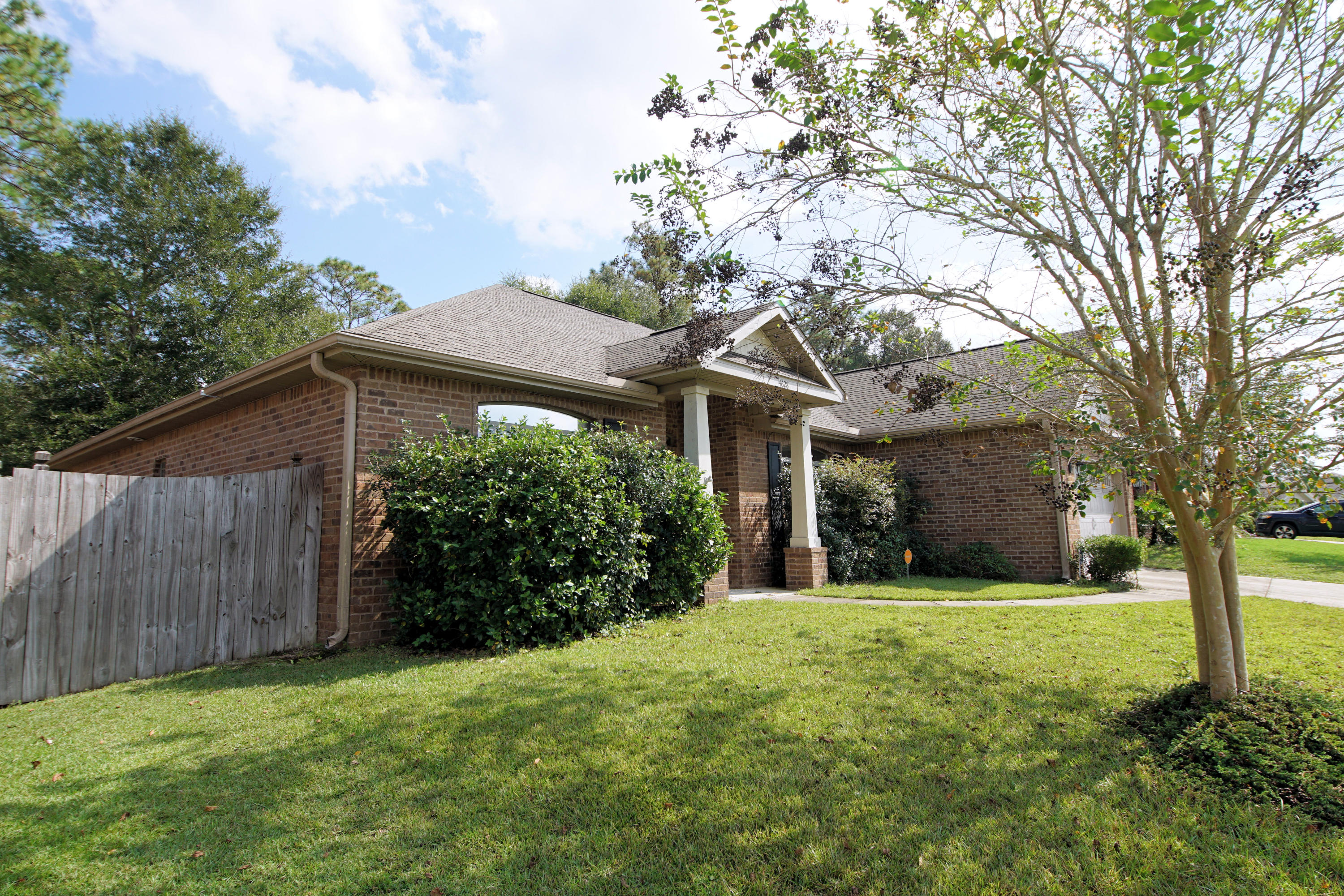 4628 Hermosa Road Crestview, FL 32539 - Photo 4 of 40 a view of a house with a yard