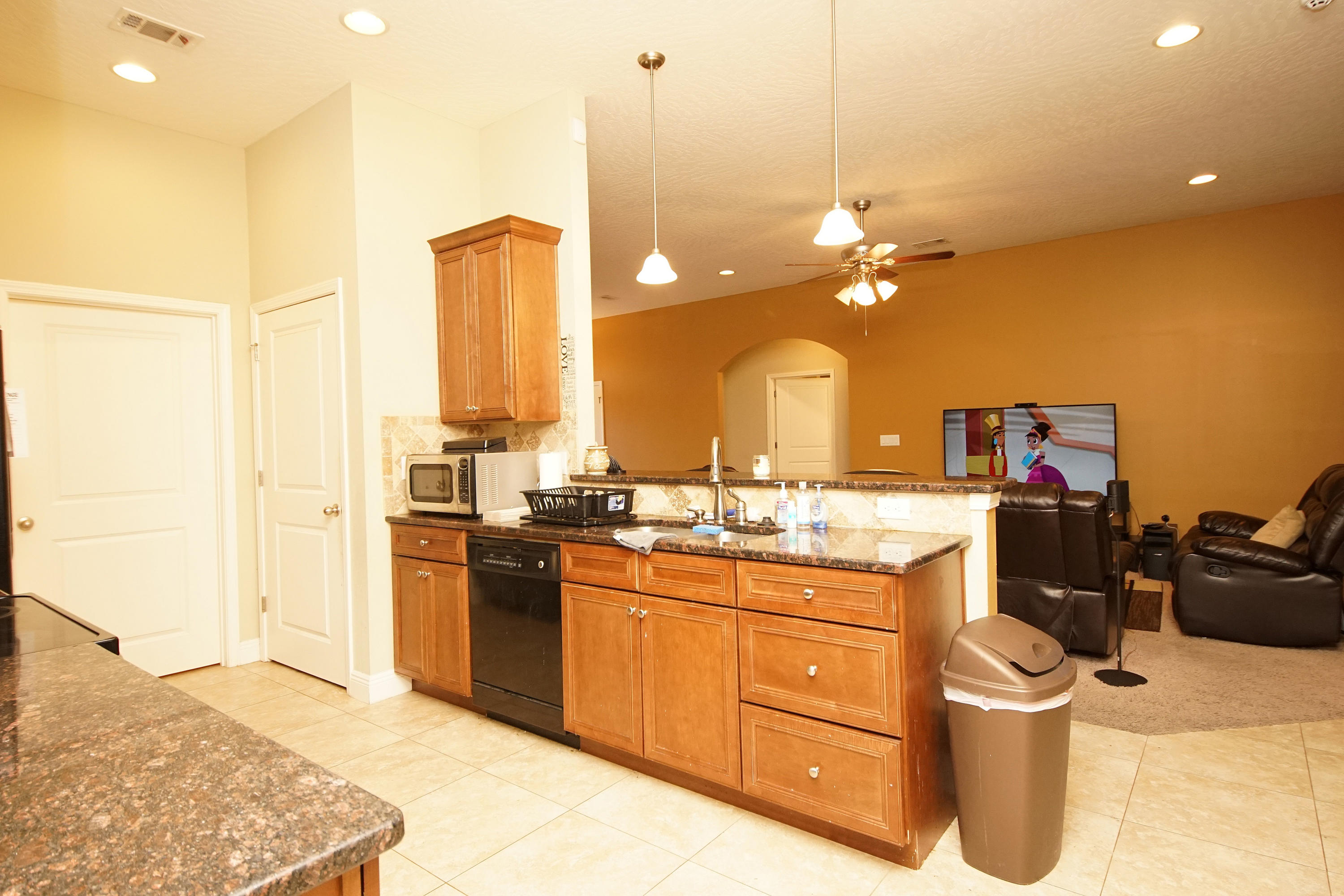 4628 Hermosa Road Crestview, FL 32539 - Photo 9 of 40 a kitchen with a sink stove and refrigerator