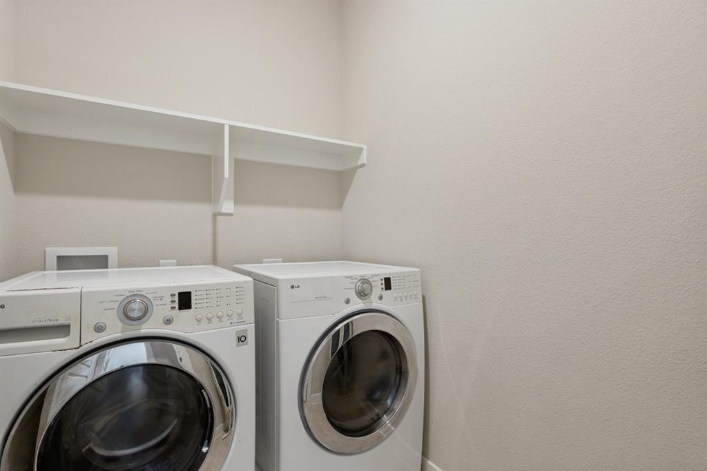 4136 Lightstone Lane Celina, TX 75009 - Photo 33 of 39 a utility room with dryer and washer