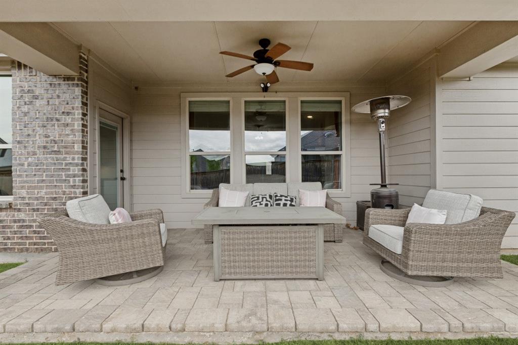 4136 Lightstone Lane Celina, TX 75009 - Photo 35 of 39 a building exterior with furniture