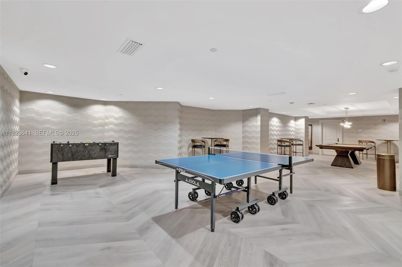 7000 Island Boulevard, Unit 1701 Aventura, FL 33160 - Photo 41 of 65 a dining room with furniture and a rug